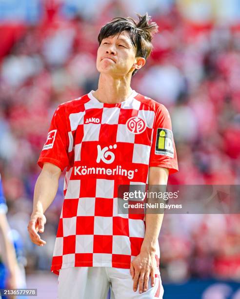 Jae Sung Lee of 1.FSV Mainz 05 looks on during the Bundesliga match between 1. FSV Mainz 05 and SV Darmstadt 98 at MEWA Arena on April 6, 2024 in...