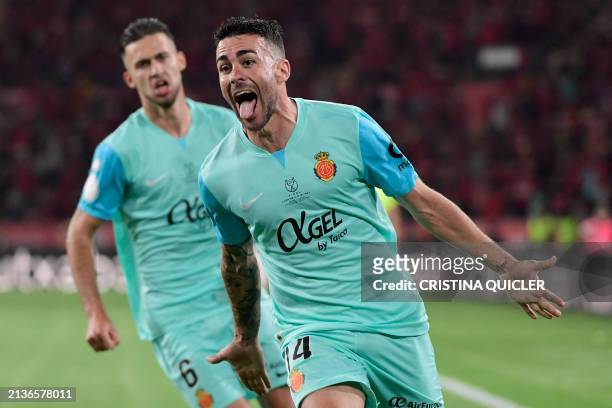 Real Mallorca's Spanish midfielder Dani Rodriguez celebrates scoring the opening goal during the Spanish Copa del Rey final football match between...