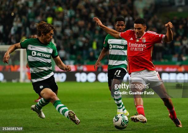 Alexander Bah of SL Benfica with Hidemasa Morita of Sporting CP in action during the Liga Portugal Betclic match between Sporting CP and SL Benfica...