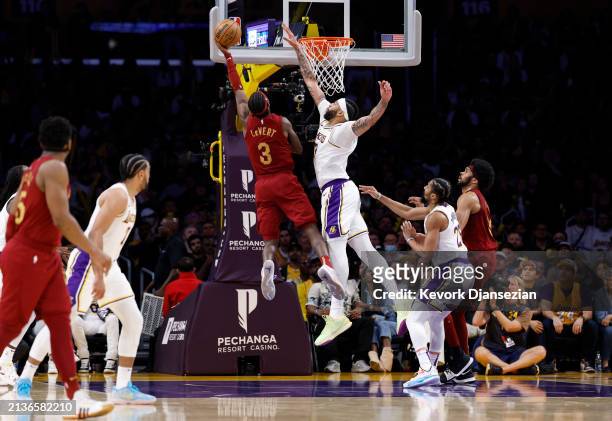 Anthony Davis of the Los Angeles Lakers elevates to block a layup by Caris LeVert of the Cleveland Cavaliers during the second half at Crypto.com...