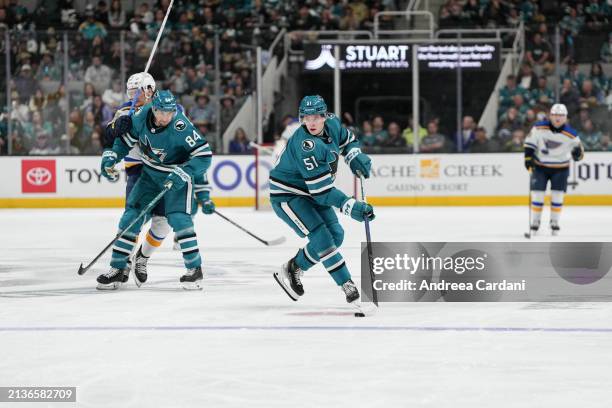 Collin Graf of the San Jose Sharks skating with the puck against the St. Louis Blues at SAP Center on April 6, 2024 in San Jose, California.