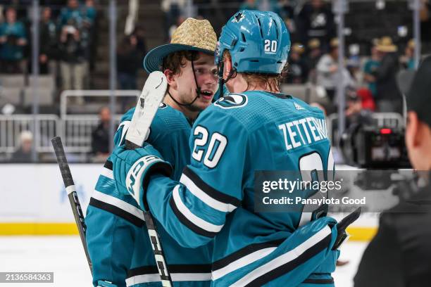 William Eklund and Fabian Zetterlund of the San Jose Sharks celebrate Eklund's hat trick to win the game in overtime against the St. Louis Blues at...