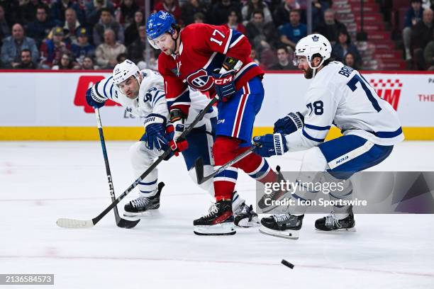 Toronto Maple Leafs defenseman Mark Giordano and Toronto Maple Leafs defenseman TJ Brodie defend agains tMontreal Canadiens right wing Josh Anderson...