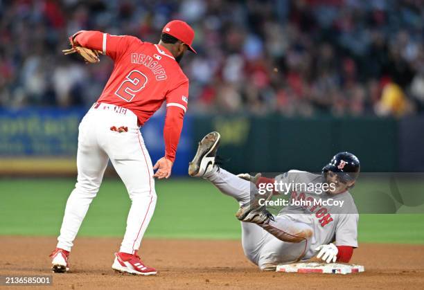 Luis Rengifo of the Los Angeles Angels tagged out Jarren Duran of the Boston Red Sox at second base in the third inning during a Major League...