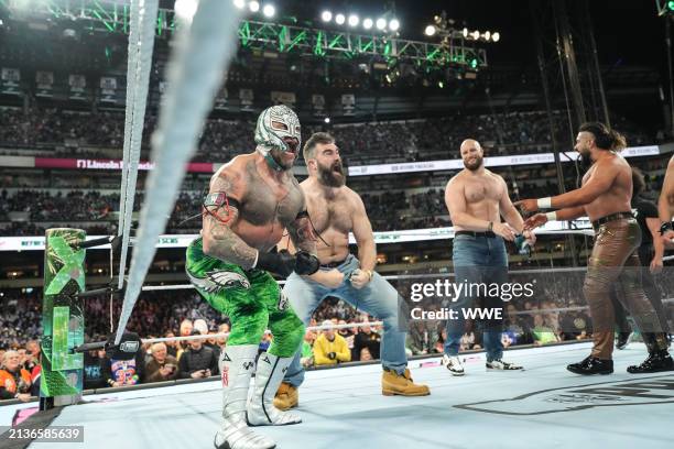 Rey Mysterio and Jason Kelce celebrating their win against Legado del Fantasma during Night One of WrestleMania 40 at Lincoln Financial Field on...