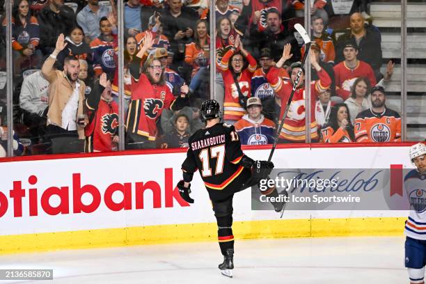 Calgary Flames Center Yegor Sharangovich celebrates after scoring a goal during the second period of an NHL game between the Calgary Flames and the...