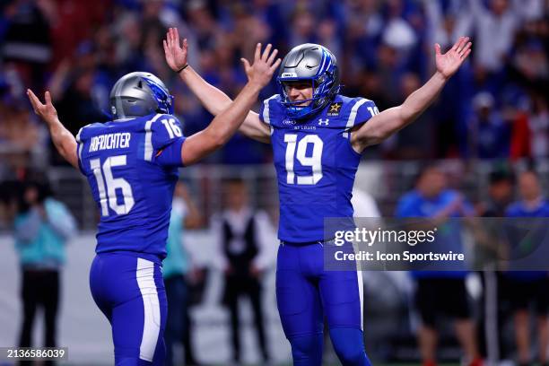 St Louis Battlehawks kicker Andre Szmyt celebrates his game winning field goal in the closing seconds of the game with St Louis Battlehawks punter...