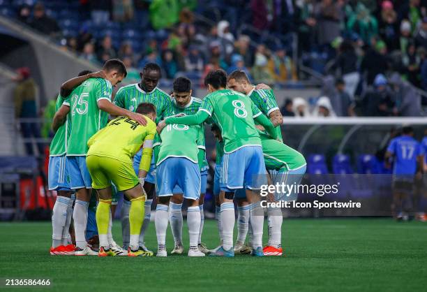 The Seattle Sounders huddle up before a MLS matchup between CF Montréal and the Seattle Sounders on April 6, 2024 at Lumen Field in Seattle, WA.