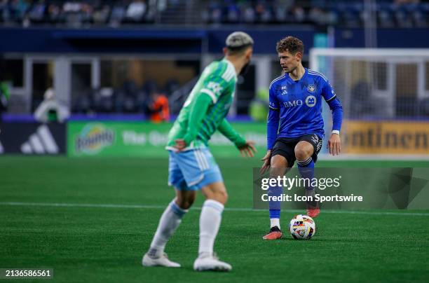 Montréal defender Joaquín Sosa controls the ball and looks for an open pass during a MLS matchup between CF Montréal and the Seattle Sounders on...