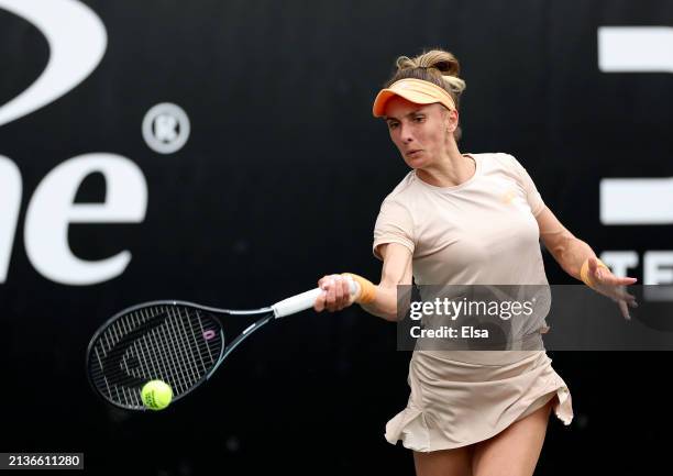 Lesia Tsurenko of the Ukraine returns a shot to Astra Sharma of Australia on Day 3 of the WTA 500 Credit One Charleston Open 2024 at Credit One...