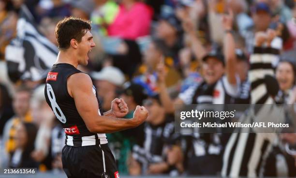 Lachie Schultz of the Magpies celebrates a goal during the 2024 AFL Round 04 match between the Collingwood Magpies and the Hawthorn Hawks at Adelaide...