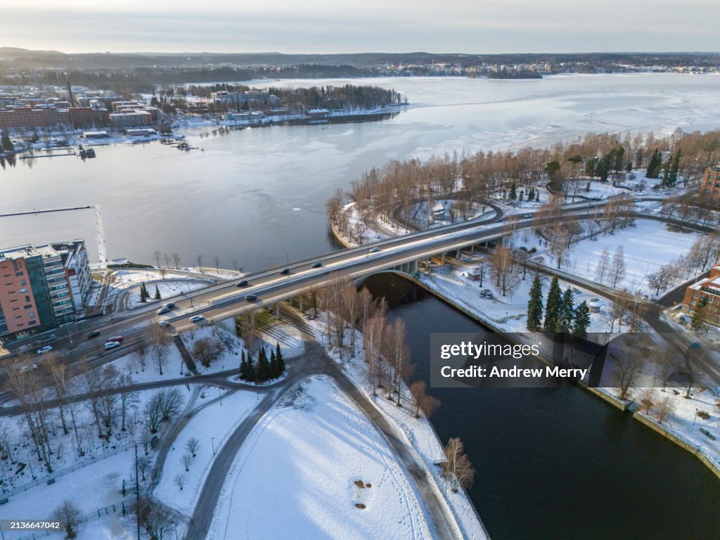 Car traffic bridge over river, lake Tampere aerial