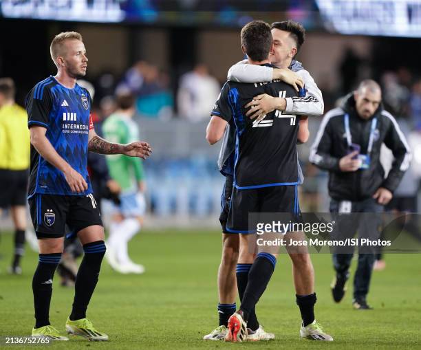 Daniel Munie of San Jose Earthquakes and Preston Judd of San Jose Earthquakes embrace as they celebrate the win with Jackson Yueill of San Jose...