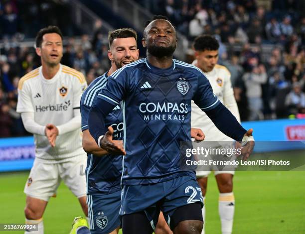 Robert Voloder and Willy Agada of Sporting Kansas City celebrate Agadas goal at the end of the first half during a game between Los Angeles Galaxy...