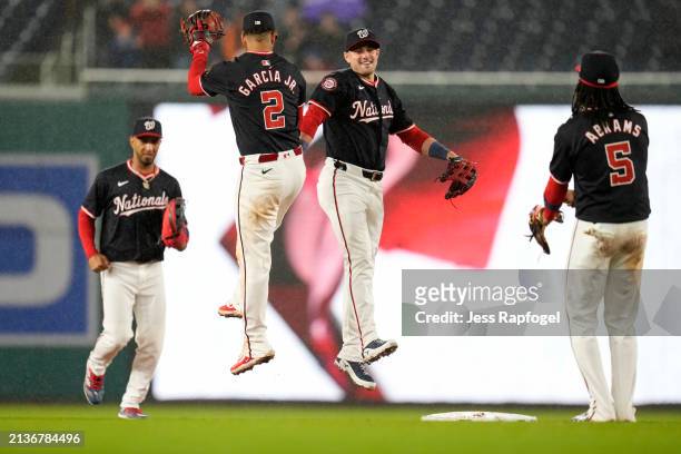 Luis Garcia Jr. #2 and Lane Thomas of the Washington Nationals celebrate after winning against the Pittsburgh Pirates at Nationals Park on April 03,...