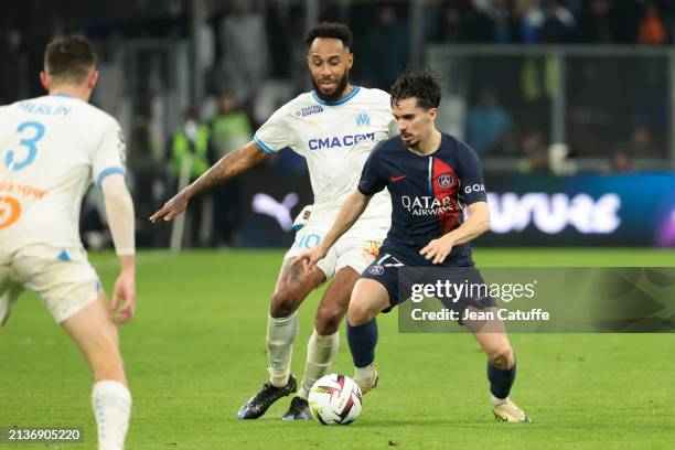 Vitinha of PSG, left Pierre-Emerick Aubameyang of Marseille during the Ligue 1 Uber Eats match between Olympique de Marseille and Paris Saint-Germain...