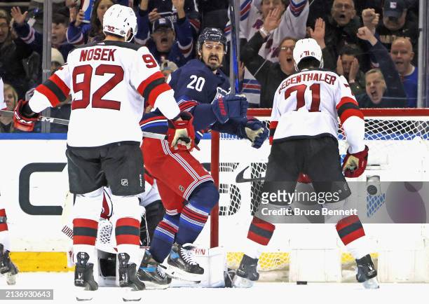 Chris Kreider of the New York Rangers celebrates his third period game-winning goal against the New Jersey Devils at Madison Square Garden on April...
