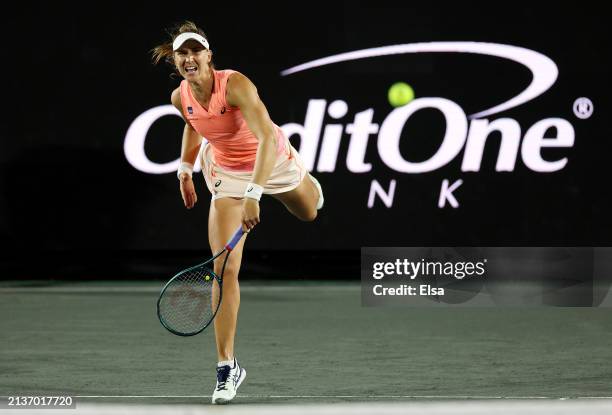 Beatriz Haddad Maia of Brazil serves the ball in the first set against Caroline Dolehide of the United States on Day 3 of the WTA 500 Credit One...