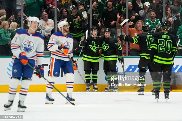 Wyatt Johnston of the Dallas Stars celebrates his goal with Sam Steel in the second period against the Edmonton Oilers at American Airlines Center on...