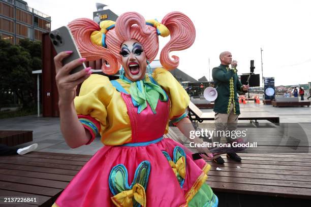 Drag Queen Kita Mean reacts to a lone protester outside the opening ceremony of the 2024 Rainbow Games on April 04, 2024 in Auckland, New Zealand....