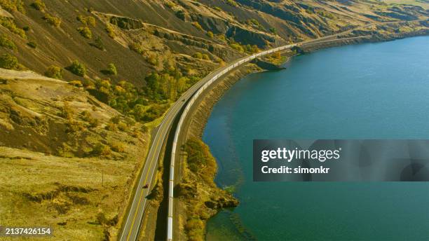 scenic view of vietnam veterans memorial highway with columbia river - vietnam veterans memorial washington stock pictures, royalty-free photos & images