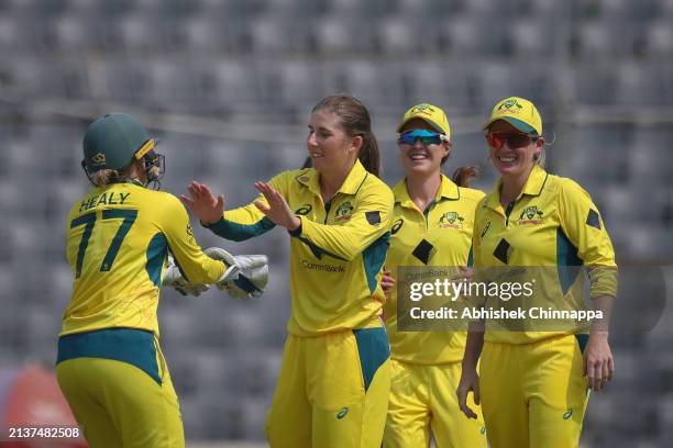 Australia's players celebrate the wicket of Rabeya Khan of Bangladesh during game three of the Women's T20 International series between Bangladesh...