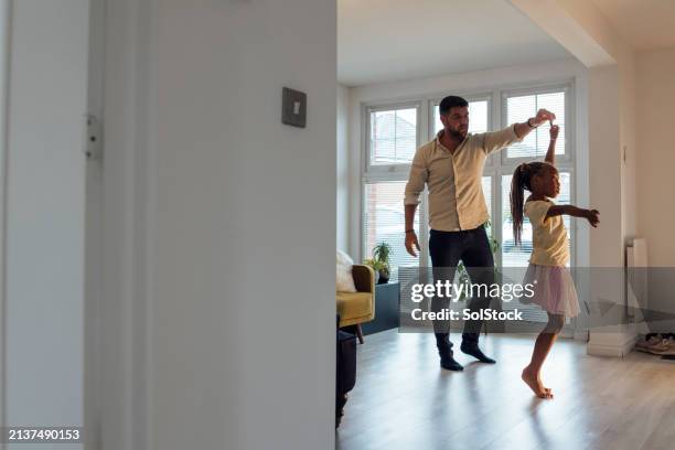 practicing dance with dad - step father stock pictures, royalty-free photos & images