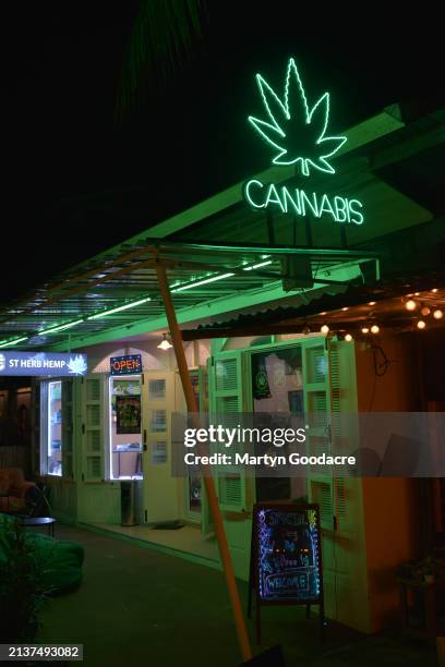 Exterior view of a cannabis shop showing neon sign featuring cannabis leaf design on Ko Samui, Thailand, 6th February 2024.