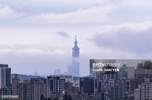 This picture shows Taipei 101, a 508-meter high commercial building, is seen from Xindian distitrict in New Taipei City on April 7, 2024.