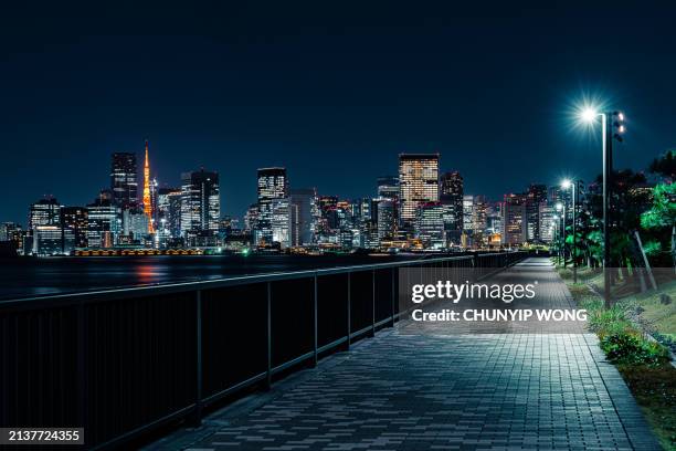 ariake-kita canal park fishing area in tokyo at night - chuo ward tokyo stock pictures, royalty-free photos & images