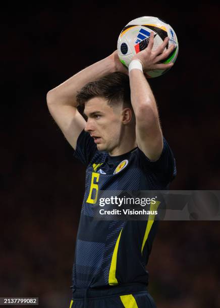 Kieran Tierney of Scotland takes a throw in during the international friendly match between Scotland and Northern Ireland at Hampden Park on March...