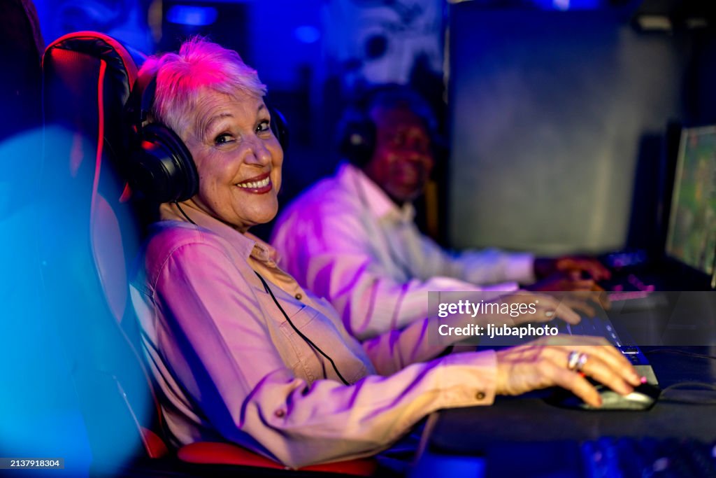 Happy Female Professional Online Video Game Player.