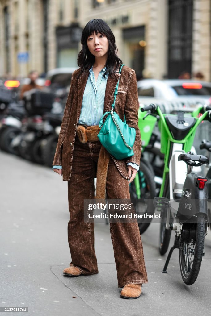 Street Style - Paris Fashion Week - Womenswear Fall/Winter 2024/2025 - Day Five