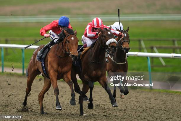 Daniel Muscutt riding Surveyor win The Get Raceday Ready Maiden Fillies' Stakes at Lingfield Park Racecourse on April 04, 2024 in Lingfield, England.