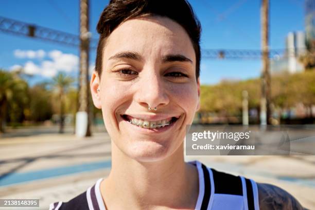 headshot of happy young basketball player, barcelona - basketball player close up stock pictures, royalty-free photos & images