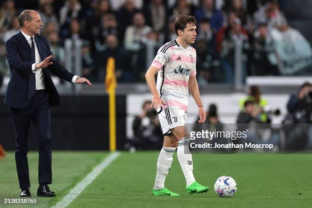 Massimiliano Allegri Head coach of Juventus reacts as Federico Chiesa of Juventus stops the ball during the Coppa Italia Semi Final match between...
