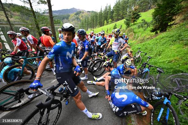 Davide Formolo of Italy and Movistar Team and a general view of the peloton waiting after the neutralisation of the race due to a multiple crash...