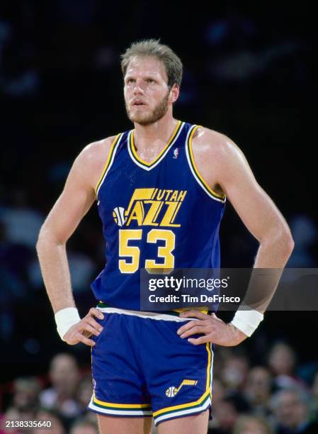 Mark Eaton, Center for the Utah Jazz looks on with hands on hips during the NBA Midwest Division basketball game against the Denver Nuggets on 6th...