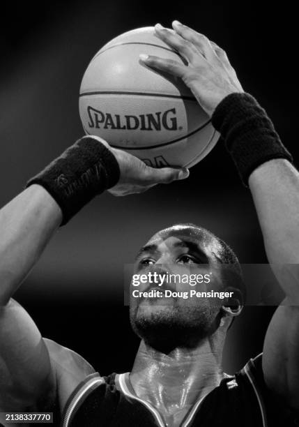 , Karl Malone, Power Forward for the Utah Jazz prepares to shoot a free throw during NBA Atlantic Division basketball game against the Washington...