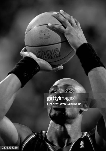 , Karl Malone, Power Forward for the Utah Jazz prepares to shoot a free throw during Game 3 of the NBA Western Conference basketball playoff game...