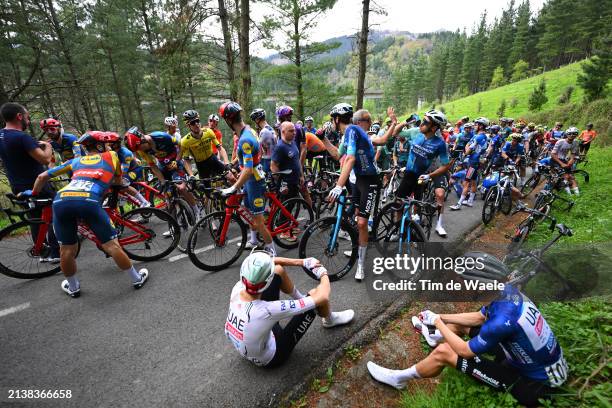 Marc Soler of Spain, Juan Ayuso of Spain and UAE Team Emirates - Blue Young Jersey and a general view of the peloton waiting at Olaeta after the...
