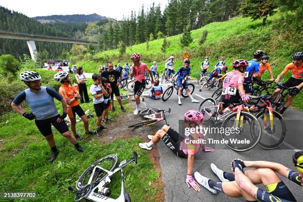 Rigoberto Uran of Colombia and Team EF Education - EasyPost and a general view of the peloton waiting at Olaeta after the neutralisation of the race...