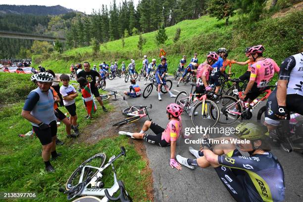 Rigoberto Uran of Colombia and Team EF Education - EasyPost and a general view of the peloton waiting at Olaeta after the neutralisation of the race...