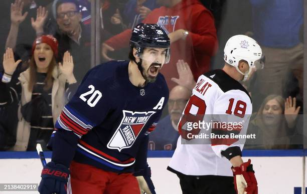 Chris Kreider of the New York Rangers celebrates his third period game-winning goal against the New Jersey Devils at Madison Square Garden on April...