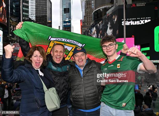 New York , United States - 6 April 2024; Mayo supporters, from left, Miriam and Matthew Turner, both originally from Doohoma in Mayo, with Liam...