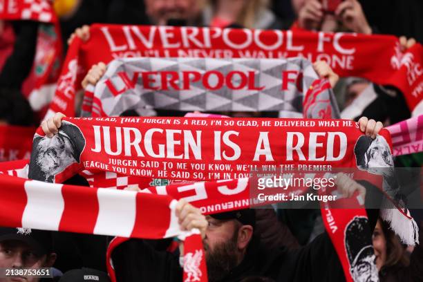Detailed view as a fan of Liverpool raises a scarf which reads "Jurgen Is A Red" prior to the Premier League match between Liverpool FC and Sheffield...