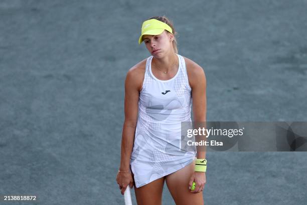 Magda Linette of Poland reacts to a lost point to Jessica Pegula of the United States on Day 4 of the WTA Tour at Credit One Stadium on April 04,...