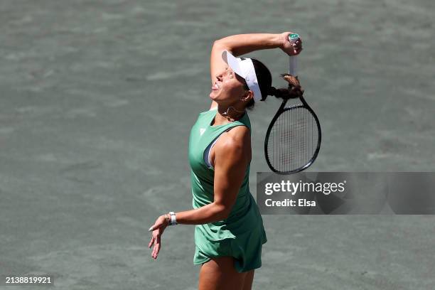 Jessica Pegula of the United States serves the ball to Magda Linette of Poland on Day 4 of the WTA Tour at Credit One Stadium on April 04, 2024 in...