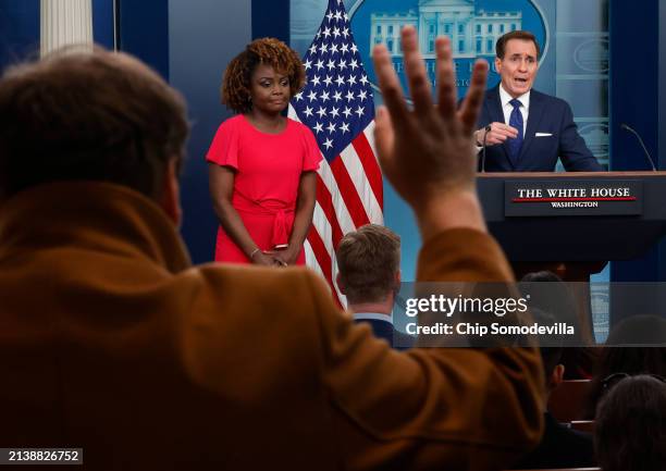 White House National Security Communications Advisor John Kirby and Press Secretary Karine Jean-Pierre talk to reporters during the daily news...