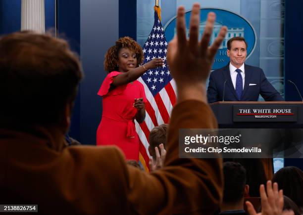 White House National Security Communications Advisor John Kirby and Press Secretary Karine Jean-Pierre talk to reporters during the daily news...